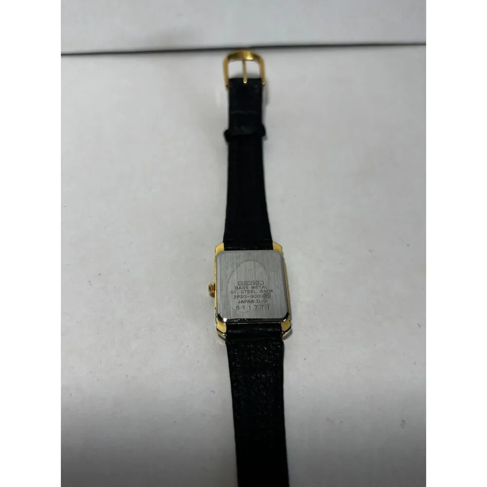 Vintage Seiko 2P20-5000 gold tone women's watch with black leather, working